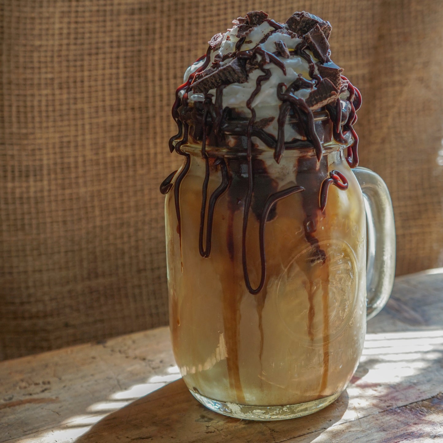 Chocolate Decadence flavored coffee with dark chocolate pieces and chocolate syrup